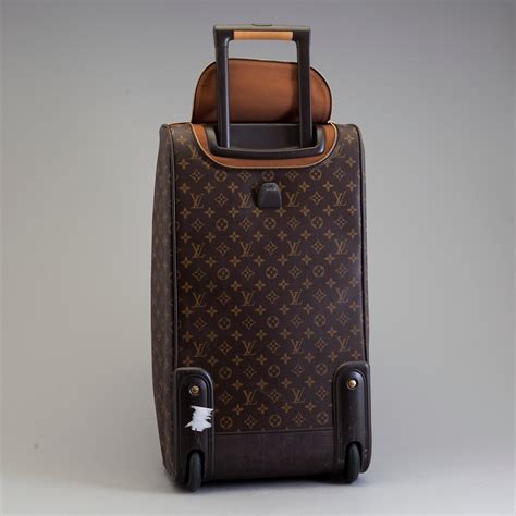 louis vuitton rolling carry on bag|Louis Vuitton suitcase with wheels.